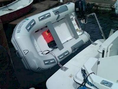 Can My Dinghy Battery Sit On Its Side When I Lift It on the Davits?